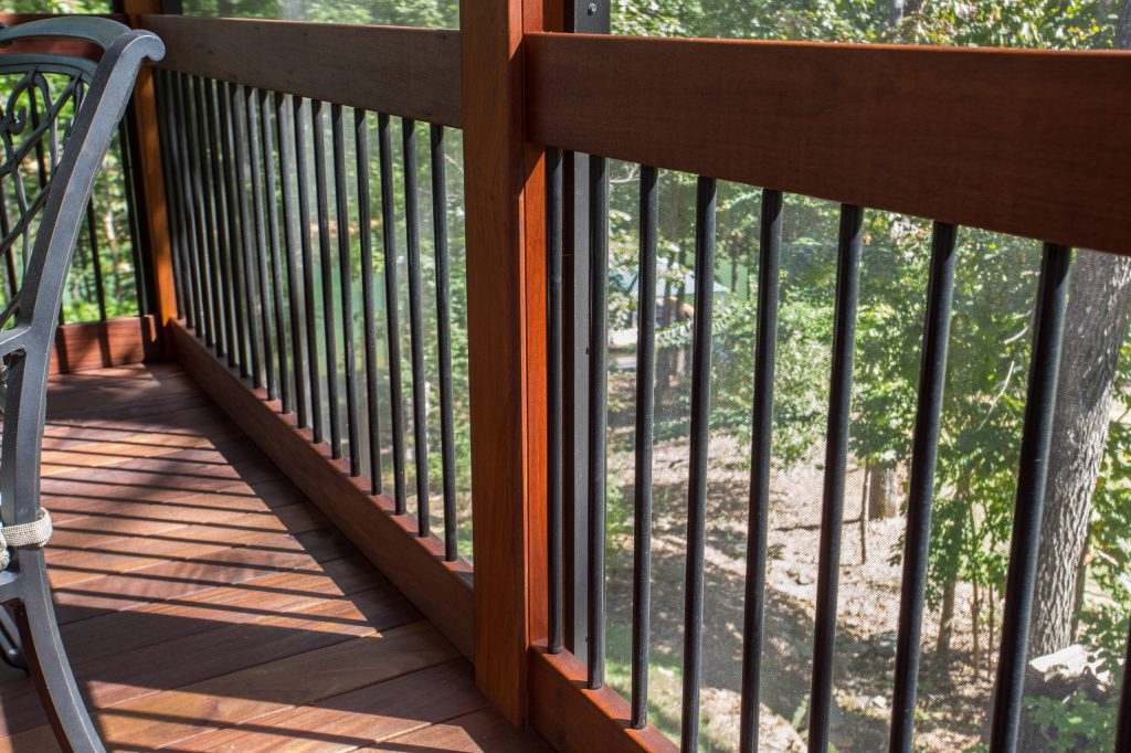 The wrought iron rails on this porch fence is a good complement to the cable railing on the rest of the porch but creates a more solid fence against the screened porch. by Alair Homes Clemson | Outdoor Photos | Porch | Landscaping | Landscape Design | Outdoor Living Space | Porch Design Ideas | Outdoor Living Space Ideas | Backyard Design