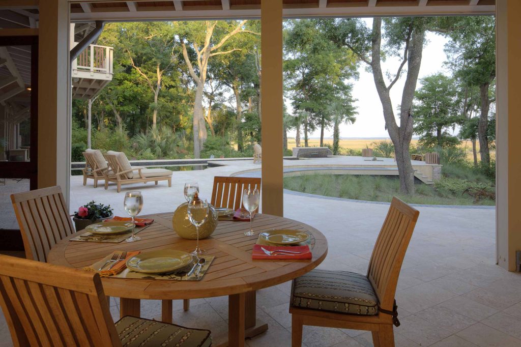 There are retractable screens between the porch and terrace.