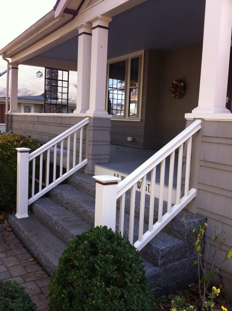 These Caledonia granite steps nicely replaced a rotting set of wooden steps on this Shingle Style home.