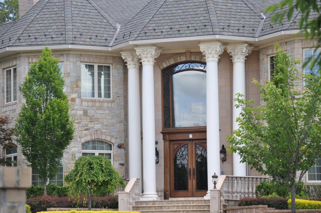 These are polymer stone fluted tapered columns with a roman corinthian capital and attic base provided by porchcolumns.com. Please email sales@porchcolumns.com or call 877-270-4817 for pricing. by Porch Columns | Outdoor Photos | Porch | Landscaping | Landscape Design | Outdoor Living Space | Porch Design Ideas | Outdoor Living Space Ideas | Backyard Design