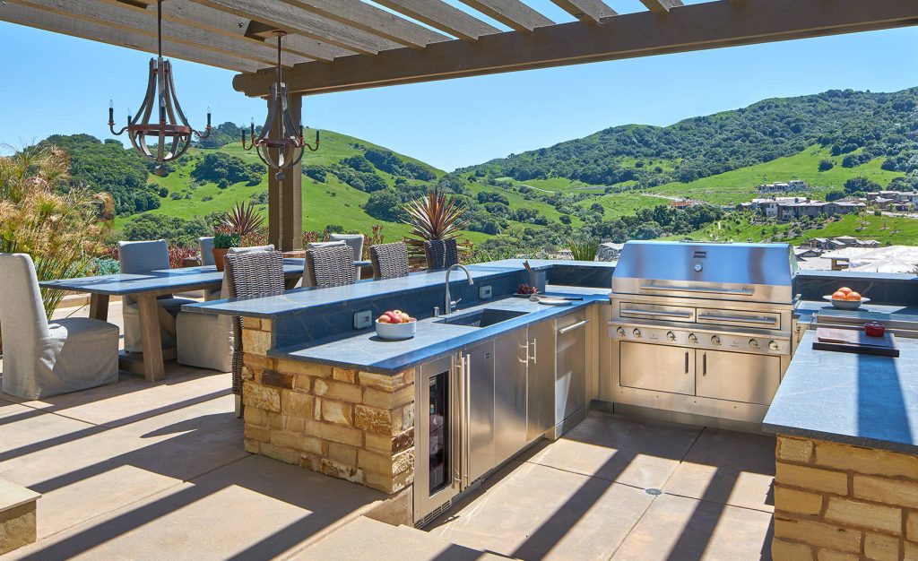This U-shaped outdoor kitchen in Orinda, CA overlooks the rolling hillsides.