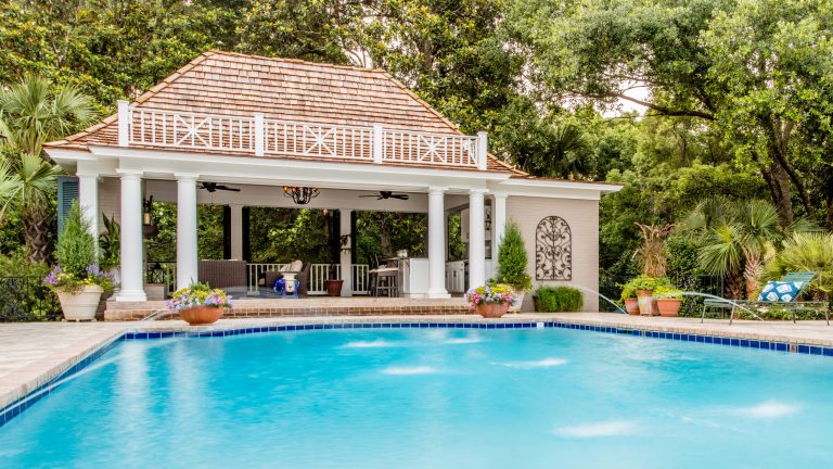 This aging pool pavilion was given new life and is now the focal point for this traditional Fairhope home.