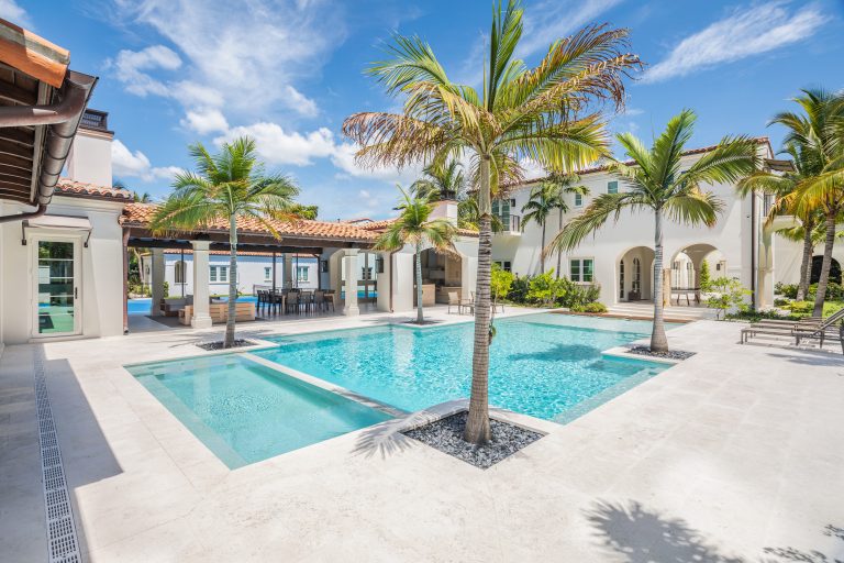 This amazing Miami Vice style pool is perfect for the Florida lifestyle! Custom stepping stones and infinity edge style makes this the perfect backyard to entertain friends and family!