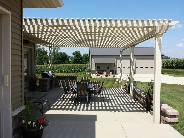 This attached pergola was created for a Garden Spot PA family. It is built over a 15x20 patio and is a tan/off-white color. Contact Garbrella Pergolas today for your attached vinyl pergola kit! by Garbrella Pergolas | Outdoor Photos | Porch | Landscaping | Landscape Design | Outdoor Living Space | Porch Design Ideas | Outdoor Living Space Ideas | Backyard Design