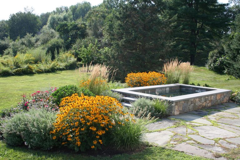 This concrete plunge pool installation and finish work involved a collaboration between Soake Pools and Woodburn and Company.