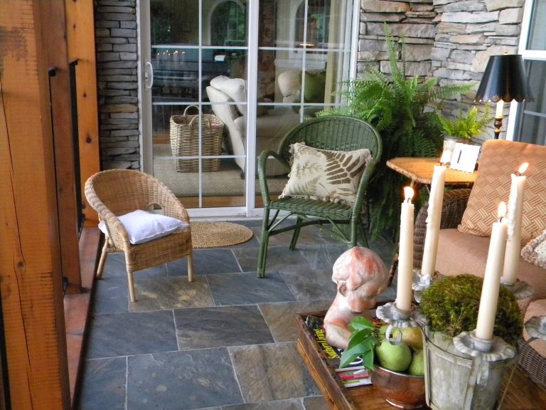 This covered porch was an addition to prevent a leak down below. It is our favorite space!