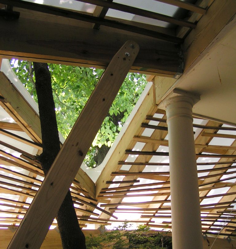 This detail highlights the connection to the garden, existing home, and new porch roof.