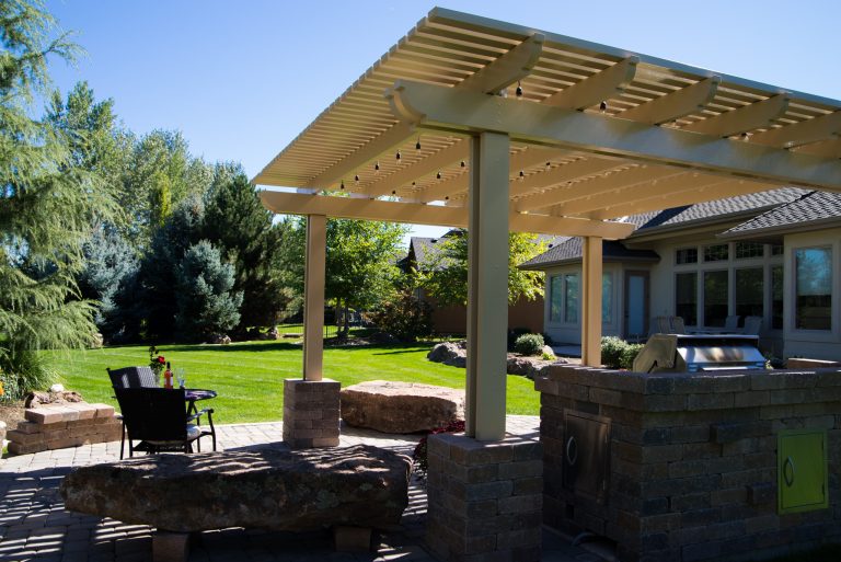 This freestanding pergola is the ultimate finish to this outdoor kitchen. Secluded in the privacy of their own backyard, these homeowners have themselves a secret oasis.