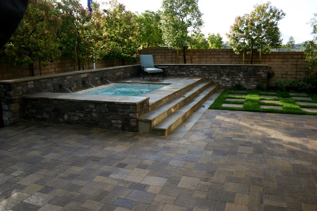 This is a spool. It is a large spa or small pool.