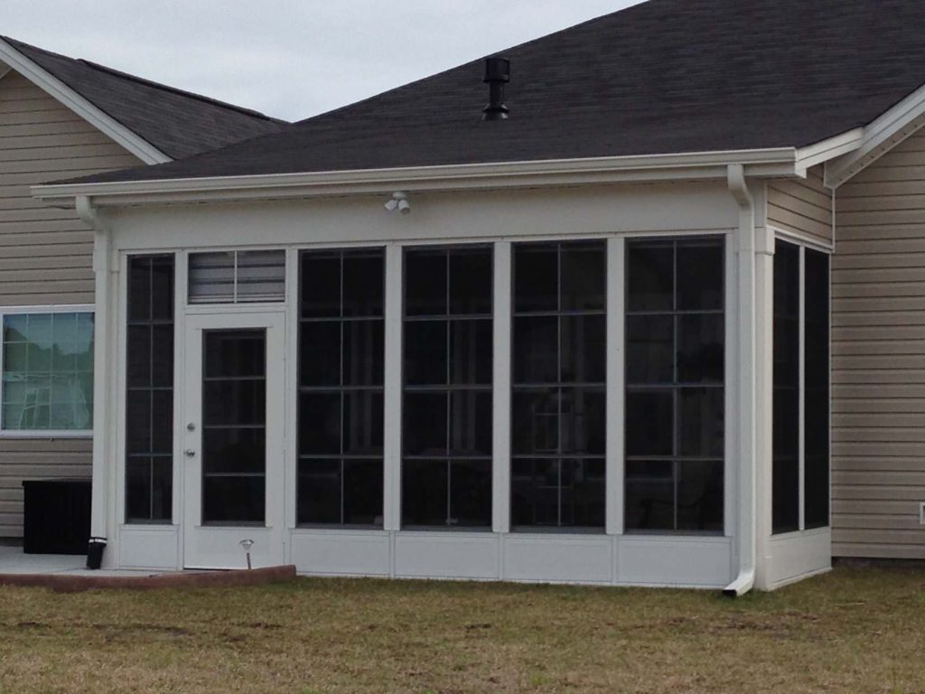 This is an EZE-Breeze Porch Enclosure we recently installed in an existing covered lanai for a homeowner.