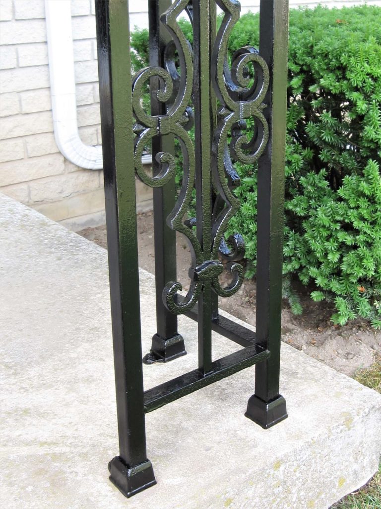 This is an "after" photo of a front porch wrought iron corner column I restored.