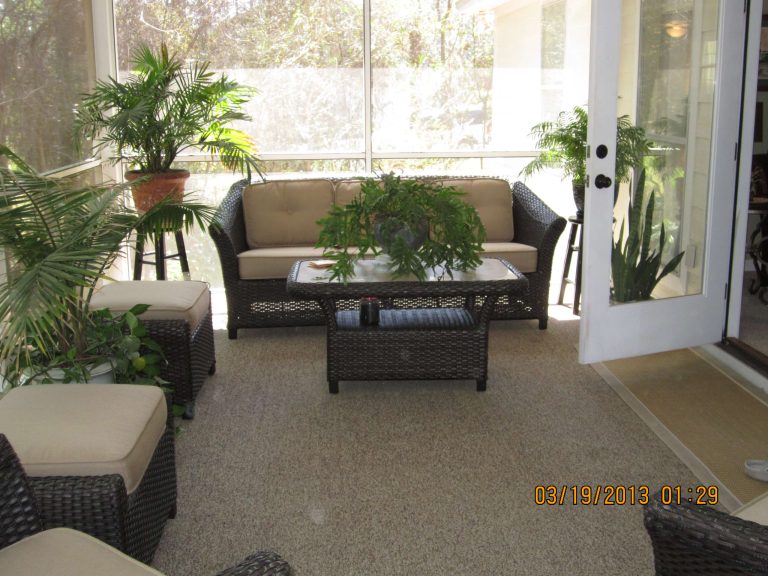 This is an elevated screened back porch that beckons you to have coffee, a cocktail or read a book. Enjoy.