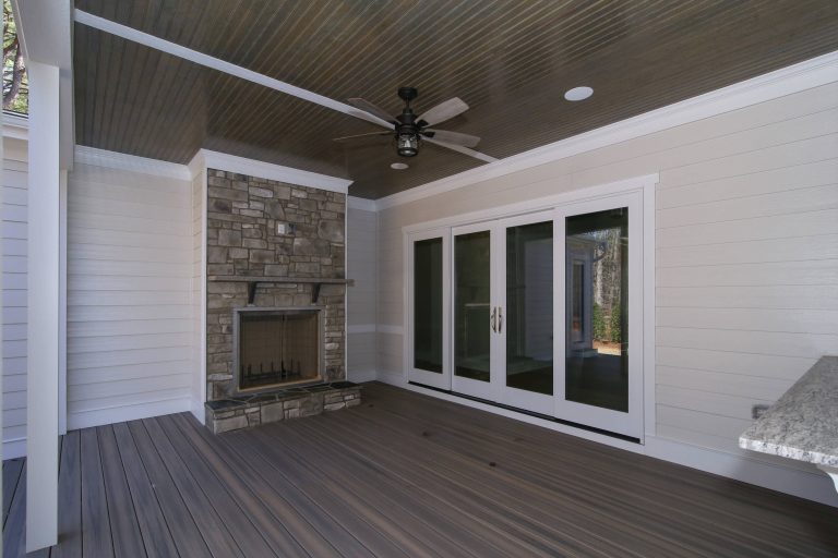 This is an example of a back porch design in Raleigh with a fire pit and a roof extension. by Colvard Farms Development Co | Outdoor Photos | Porch | Landscaping | Landscape Design | Outdoor Living Space | Porch Design Ideas | Outdoor Living Space Ideas | Backyard Design