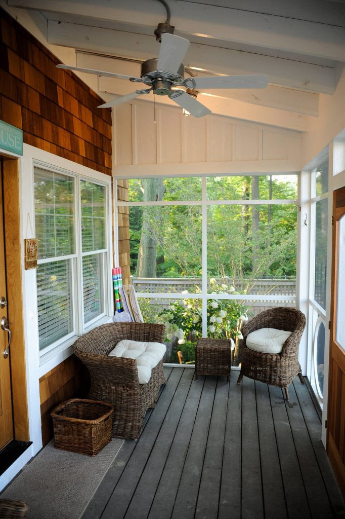 This is an example of a coastal porch design in Grand Rapids. by Becky Schrotenboer Designs | Outdoor Photos | Porch | Landscaping | Landscape Design | Outdoor Living Space | Porch Design Ideas | Outdoor Living Space Ideas | Backyard Design