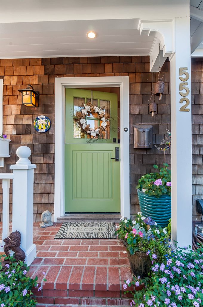 This is an example of a coastal porch design in Los Angeles. by Judith Griffin Design | Outdoor Photos | Porch | Landscaping | Landscape Design | Outdoor Living Space | Porch Design Ideas | Outdoor Living Space Ideas | Backyard Design