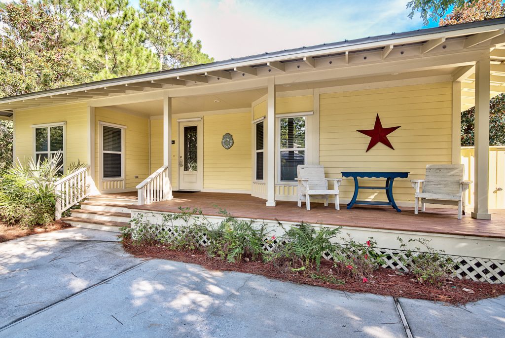 This is an example of a coastal porch design in Miami. by Austin Follos Photography | Outdoor Photos | Porch | Landscaping | Landscape Design | Outdoor Living Space | Porch Design Ideas | Outdoor Living Space Ideas | Backyard Design