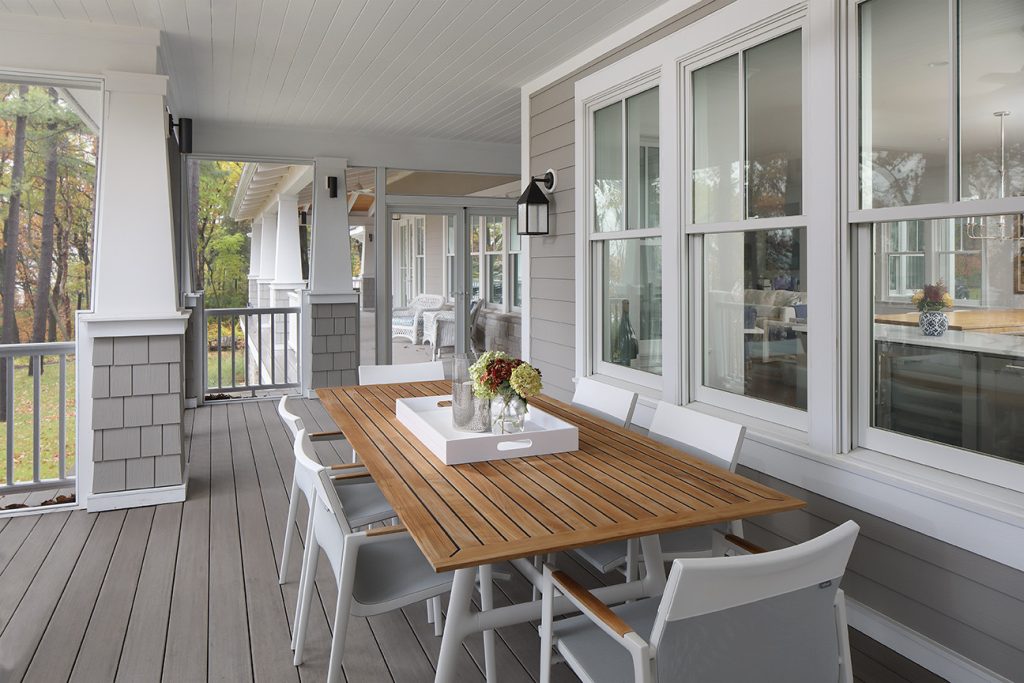 This is an example of a coastal porch design in Milwaukee. by Colby Construction | Outdoor Photos | Porch | Landscaping | Landscape Design | Outdoor Living Space | Porch Design Ideas | Outdoor Living Space Ideas | Backyard Design