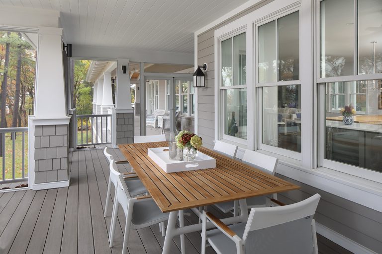 This is an example of a coastal porch design in Milwaukee. by Colby Construction | Outdoor Photos | Porch | Landscaping | Landscape Design | Outdoor Living Space | Porch Design Ideas | Outdoor Living Space Ideas | Backyard Design