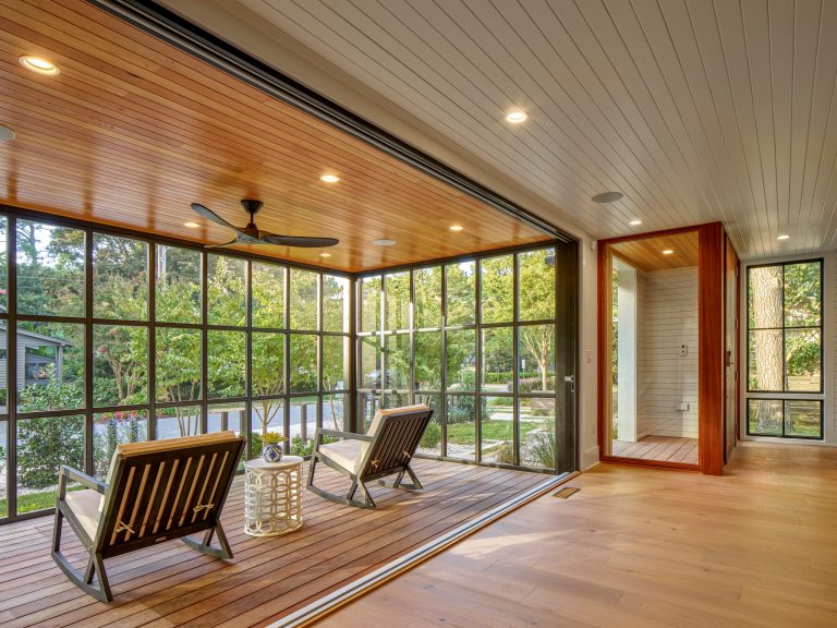 This is an example of a coastal porch design in Other. by McCown Design | Outdoor Photos | Porch | Landscaping | Landscape Design | Outdoor Living Space | Porch Design Ideas | Outdoor Living Space Ideas | Backyard Design