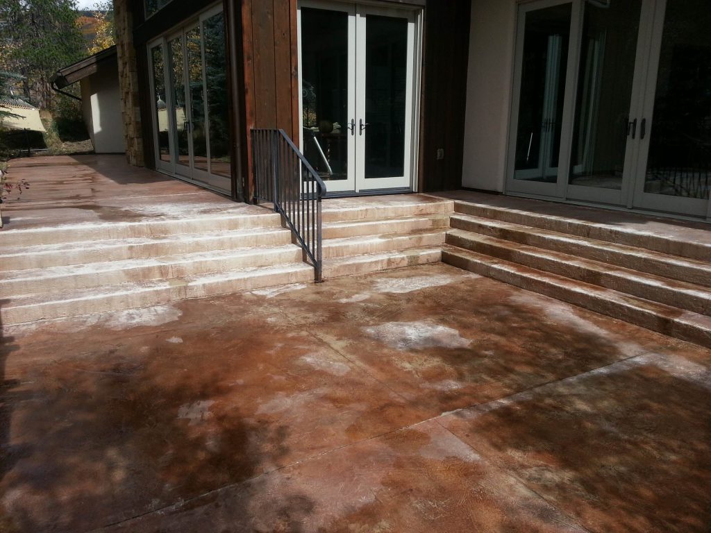 This is an example of a contemporary concrete porch design in Denver. by Todd Alan | Outdoor Photos | Porch | Landscaping | Landscape Design | Outdoor Living Space | Porch Design Ideas | Outdoor Living Space Ideas | Backyard Design