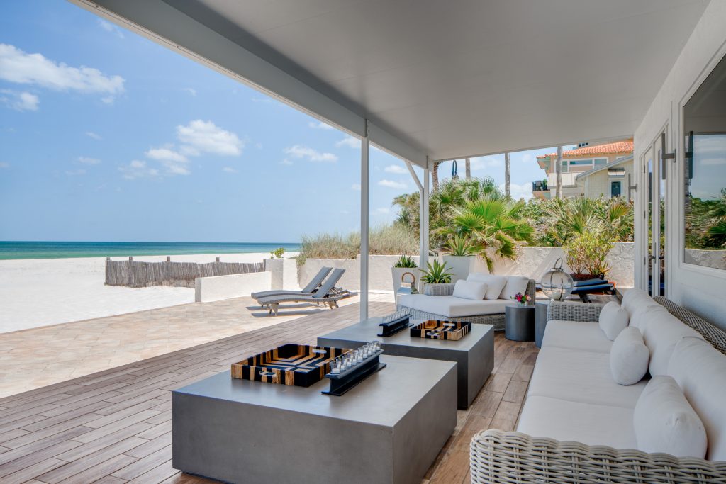 This is an example of a contemporary porch design in Tampa. by NanaWall | Outdoor Photos | Porch | Landscaping | Landscape Design | Outdoor Living Space | Porch Design Ideas | Outdoor Living Space Ideas | Backyard Design