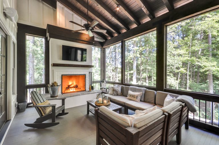 This is an example of a cottage screened-in porch design in Atlanta with decking and a roof extension. by Cooper Jones LLC | Outdoor Photos | Porch | Landscaping | Landscape Design | Outdoor Living Space | Porch Design Ideas | Outdoor Living Space Ideas | Backyard Design