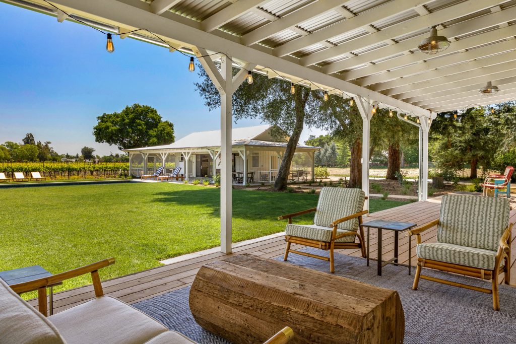 This is an example of a country back porch design in San Francisco with decking and a roof extension. by Liftec Media | Outdoor Photos | Porch | Landscaping | Landscape Design | Outdoor Living Space | Porch Design Ideas | Outdoor Living Space Ideas | Backyard Design