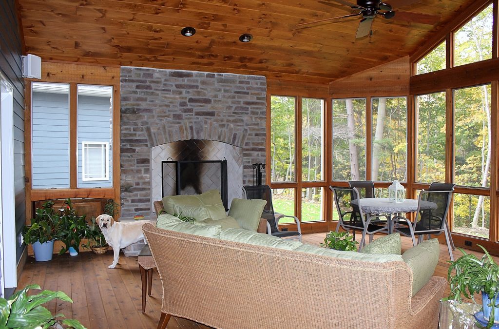 This is an example of a craftsman screened-in back porch design in Other with decking and a roof extension. by Laughlin Builders, LLC | Outdoor Photos | Porch | Landscaping | Landscape Design | Outdoor Living Space | Porch Design Ideas | Outdoor Living Space Ideas | Backyard Design