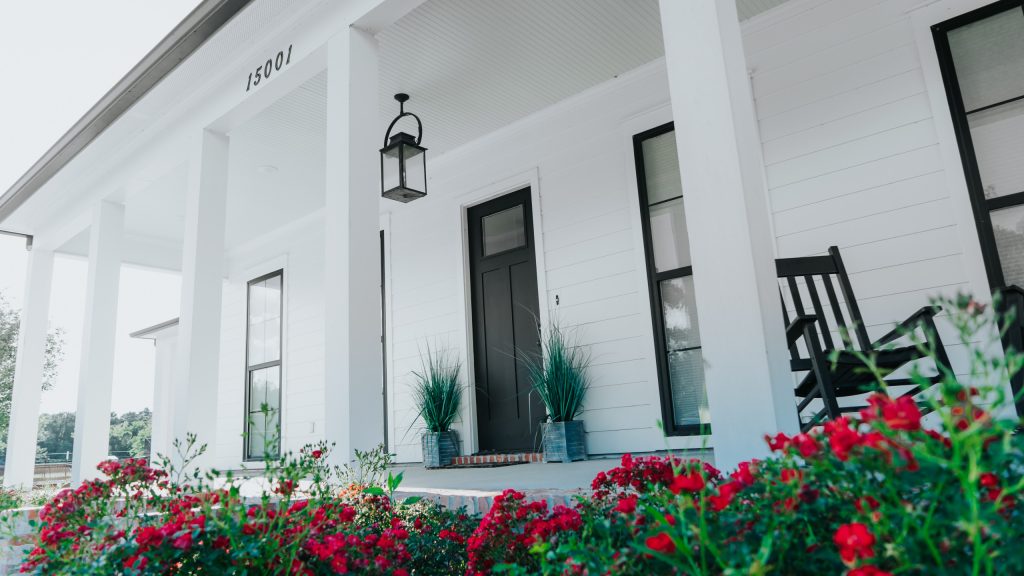 This is an example of a farmhouse porch design in New Orleans. by User | Outdoor Photos | Porch | Landscaping | Landscape Design | Outdoor Living Space | Porch Design Ideas | Outdoor Living Space Ideas | Backyard Design