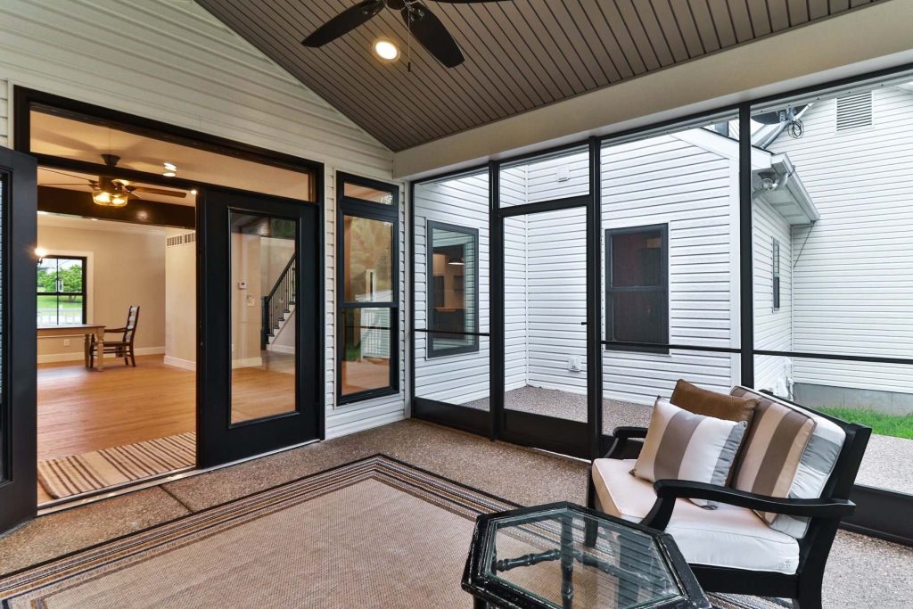 This is an example of a farmhouse porch design in St Louis. by Becky Trent | Outdoor Photos | Porch | Landscaping | Landscape Design | Outdoor Living Space | Porch Design Ideas | Outdoor Living Space Ideas | Backyard Design