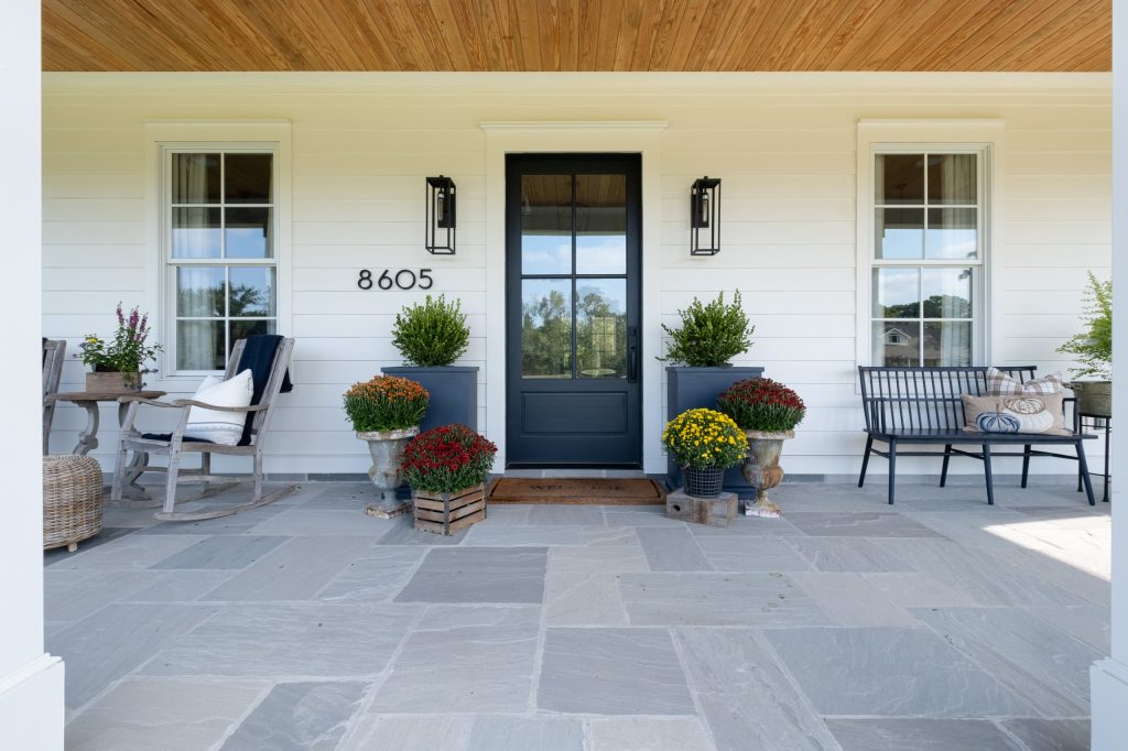 This is an example of a huge traditional stone porch design in Little Rock with an awning. by Bret Franks Construction, Inc. | Outdoor Photos | Porch | Landscaping | Landscape Design | Outdoor Living Space | Porch Design Ideas | Outdoor Living Space Ideas | Backyard Design