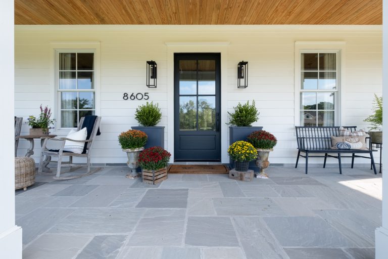 This is an example of a huge traditional stone porch design in Little Rock with an awning. by Bret Franks Construction, Inc. | Outdoor Photos | Porch | Landscaping | Landscape Design | Outdoor Living Space | Porch Design Ideas | Outdoor Living Space Ideas | Backyard Design