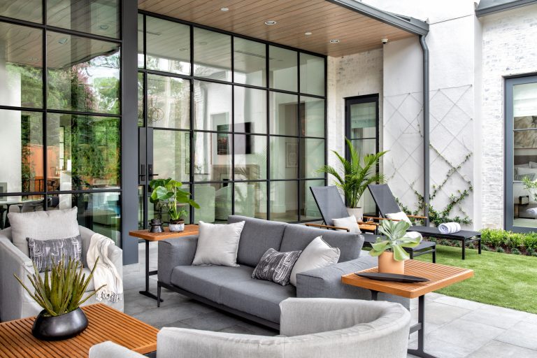 This is an example of a huge transitional back porch design in Houston with a fireplace, decking and a roof extension. by Frankel Design Build | Outdoor Photos | Porch | Landscaping | Landscape Design | Outdoor Living Space | Porch Design Ideas | Outdoor Living Space Ideas | Backyard Design