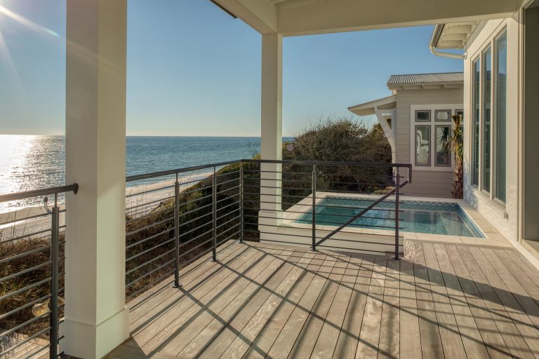 This is an example of a large coastal metal railing porch design in Other with decking and a roof extension. by Geoff Chick & Associates | Outdoor Photos | Porch | Landscaping | Landscape Design | Outdoor Living Space | Porch Design Ideas | Outdoor Living Space Ideas | Backyard Design