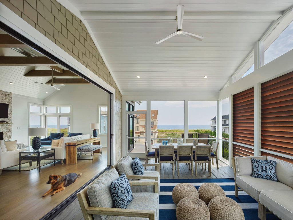 This is an example of a large coastal screened-in side porch design in Other with decking and a roof extension. by Scott Edmonston Architecture Studio | Outdoor Photos | Porch | Landscaping | Landscape Design | Outdoor Living Space | Porch Design Ideas | Outdoor Living Space Ideas | Backyard Design