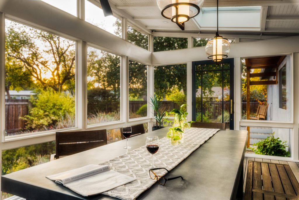 This is an example of a large contemporary screened-in back porch design in Sacramento with decking and a roof extension. by MAK Design + Build Inc. | Outdoor Photos | Porch | Landscaping | Landscape Design | Outdoor Living Space | Porch Design Ideas | Outdoor Living Space Ideas | Backyard Design