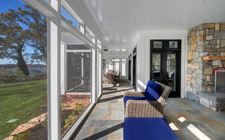 This is an example of a large cottage tile screened-in back porch design in Baltimore with a roof extension. by Avalon Associates, Inc. | Outdoor Photos | Porch | Landscaping | Landscape Design | Outdoor Living Space | Porch Design Ideas | Outdoor Living Space Ideas | Backyard Design