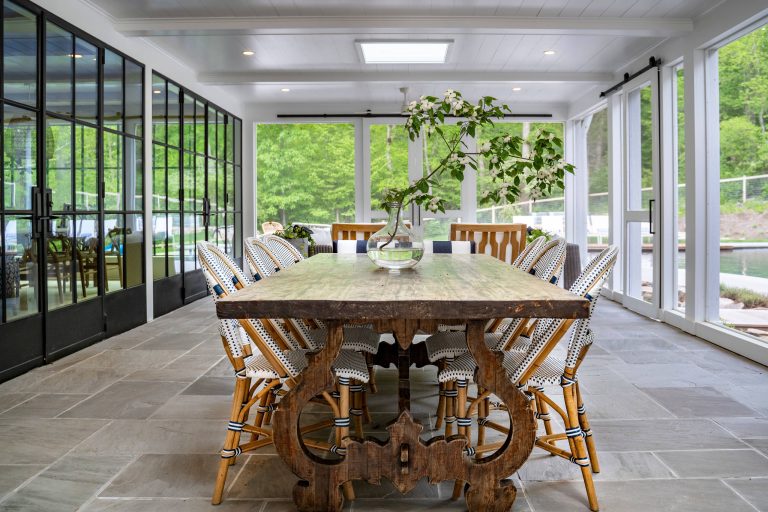 This is an example of a large country stone screened-in back porch design in Other with a roof extension. by Jonathan Miller Architects | Outdoor Photos | Porch | Landscaping | Landscape Design | Outdoor Living Space | Porch Design Ideas | Outdoor Living Space Ideas | Backyard Design