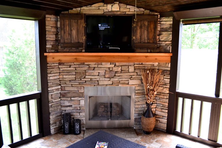 This is an example of a large craftsman stone screened-in back porch design in Nashville with a roof extension. by Willow Branch Landscapes | Outdoor Photos | Porch | Landscaping | Landscape Design | Outdoor Living Space | Porch Design Ideas | Outdoor Living Space Ideas | Backyard Design