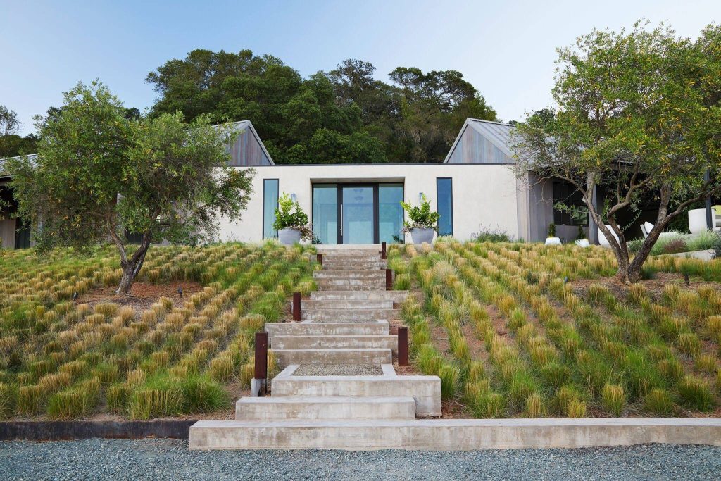 This is an example of a large farmhouse backyard concrete paver landscaping in San Francisco.