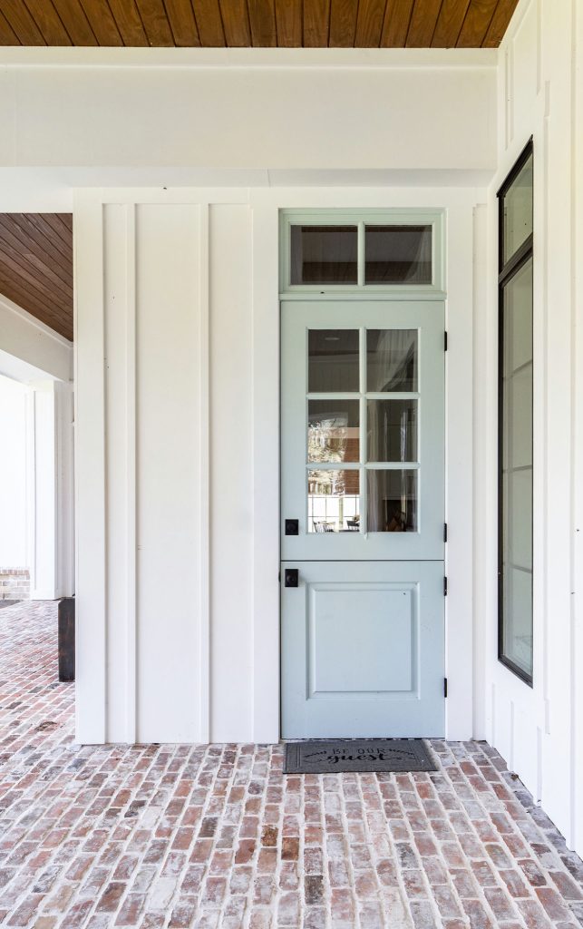 This is an example of a large farmhouse brick back porch design in Houston with a fireplace and a roof extension. by Wyrick Residential Design | Outdoor Photos | Porch | Landscaping | Landscape Design | Outdoor Living Space | Porch Design Ideas | Outdoor Living Space Ideas | Backyard Design