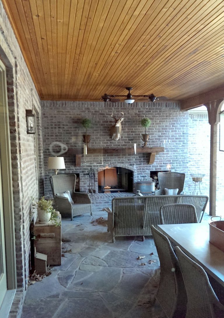 This is an example of a large farmhouse stone back porch design in Other with a fire pit and a roof extension. by Stone Harbor Custom Homes Inc. | Outdoor Photos | Porch | Landscaping | Landscape Design | Outdoor Living Space | Porch Design Ideas | Outdoor Living Space Ideas | Backyard Design