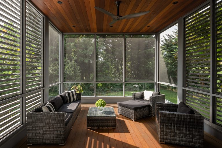This is an example of a large modern screened-in and metal railing back porch design in DC Metro with a roof extension. by Anthony Wilder Design/Build, Inc. | Outdoor Photos | Porch | Landscaping | Landscape Design | Outdoor Living Space | Porch Design Ideas | Outdoor Living Space Ideas | Backyard Design