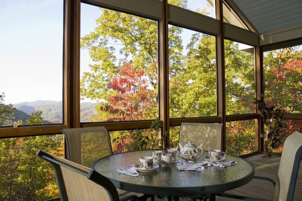 This is an example of a large modern screened-in back porch design in Other with decking and a roof extension. by Harris Architects, PLLC | Outdoor Photos | Porch | Landscaping | Landscape Design | Outdoor Living Space | Porch Design Ideas | Outdoor Living Space Ideas | Backyard Design