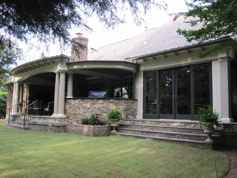 This is an example of a large rustic tile porch design in Other with a roof extension. by B.E.Womick General Contractor, LLC | Outdoor Photos | Porch | Landscaping | Landscape Design | Outdoor Living Space | Porch Design Ideas | Outdoor Living Space Ideas | Backyard Design