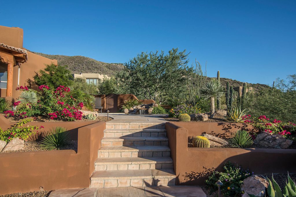 This is an example of a large southwestern backyard landscaping in Phoenix.