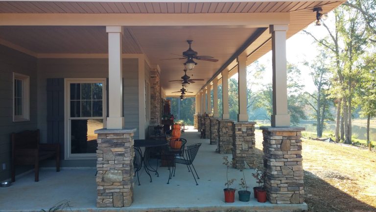 This is an example of a large traditional concrete back porch design in Atlanta with a roof extension. by MASTER HOME DESIGNS | Outdoor Photos | Porch | Landscaping | Landscape Design | Outdoor Living Space | Porch Design Ideas | Outdoor Living Space Ideas | Backyard Design