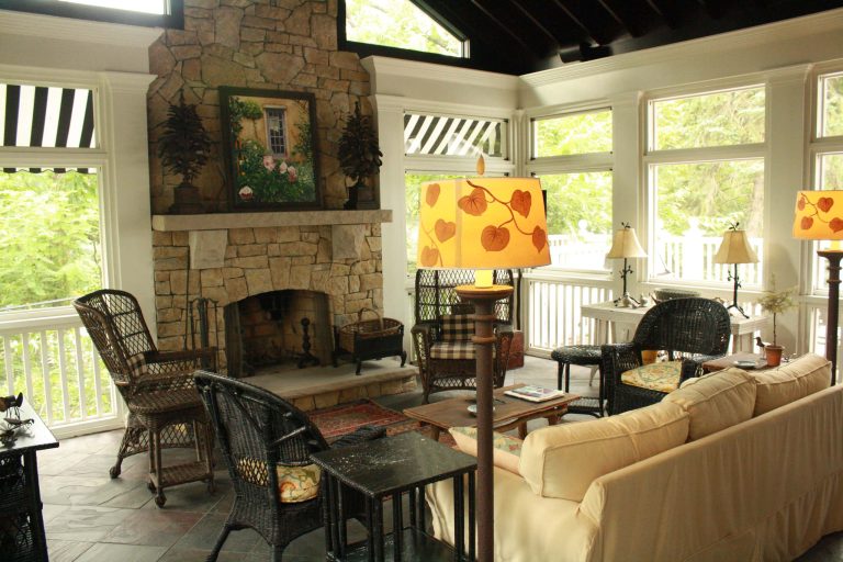 This is an example of a large traditional tile back porch design in Louisville with a roof extension. by Stonehenge Construction LLC | Outdoor Photos | Porch | Landscaping | Landscape Design | Outdoor Living Space | Porch Design Ideas | Outdoor Living Space Ideas | Backyard Design