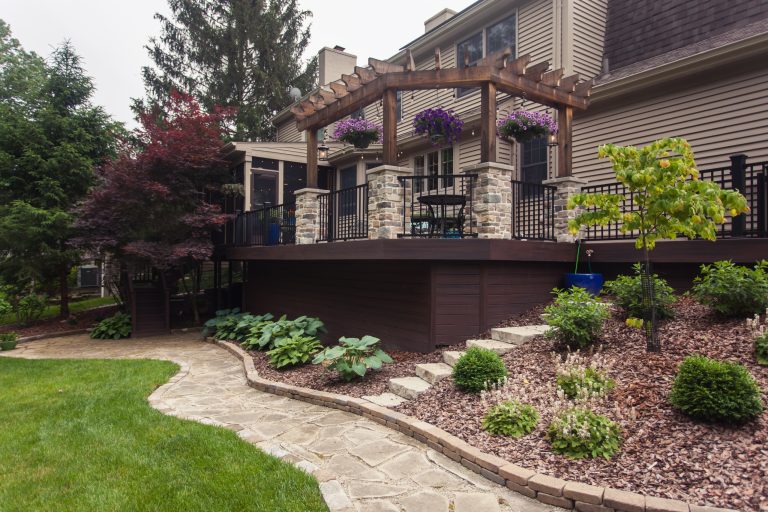 This is an example of a large transitional screened-in back porch design in Cincinnati with decking and a roof extension. by Legacy Builders Group | Outdoor Photos | Porch | Landscaping | Landscape Design | Outdoor Living Space | Porch Design Ideas | Outdoor Living Space Ideas | Backyard Design