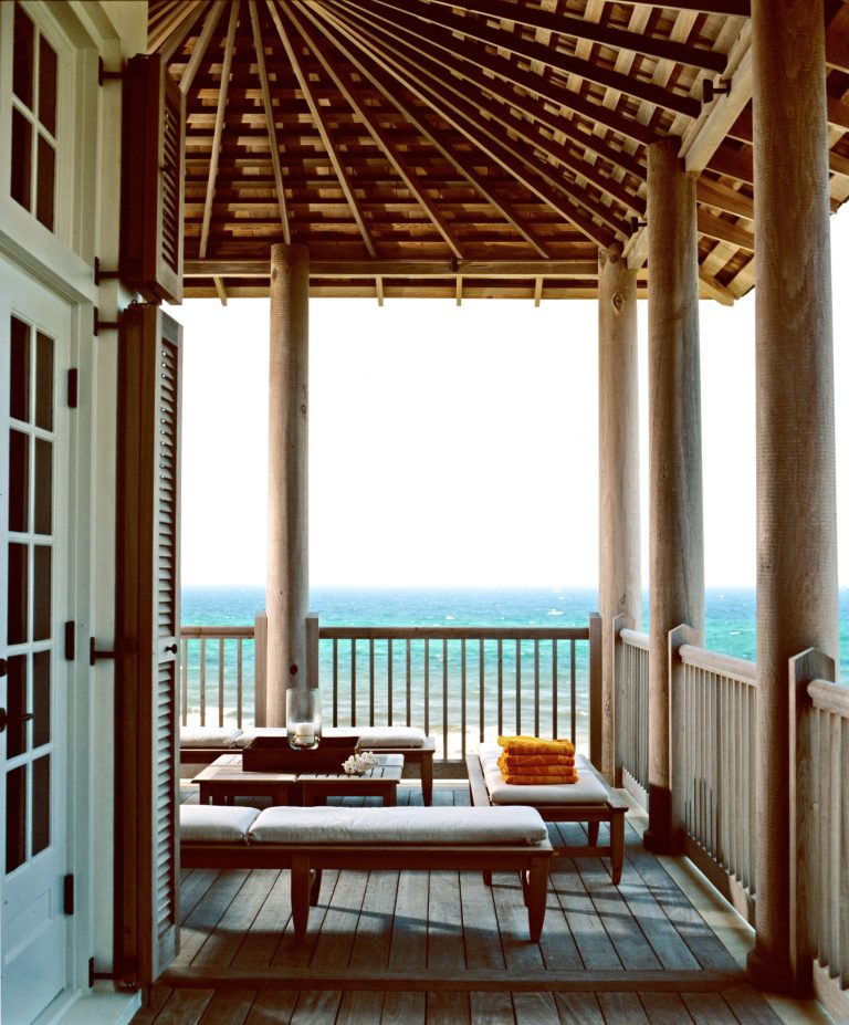 This is an example of a large tropical back porch design in Miami with decking and a roof extension. by Grand Floridian Builders, Inc. | Outdoor Photos | Porch | Landscaping | Landscape Design | Outdoor Living Space | Porch Design Ideas | Outdoor Living Space Ideas | Backyard Design